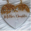 Heart in two keychains